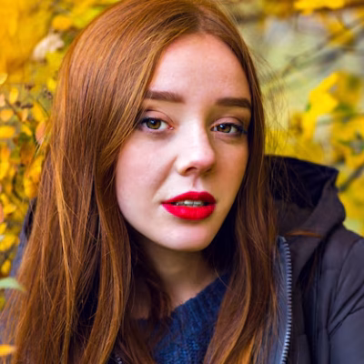 romantic-girl-with-shiny-straight-hair-looking-away-hiding-yellow-foliage-close-up-outdoor-portrait-lonesome-brunette-female-model-posing-autumn-park_291049-1821